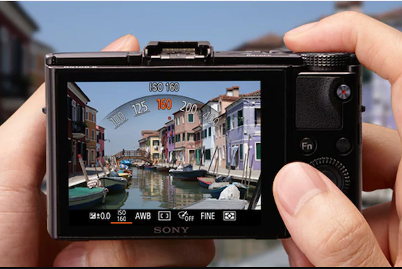 a person holding a camera