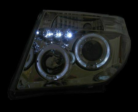 Предни светлини Ангелски очи LED за Nissan Navara / Pathfinder Черно 2005-2009 1бр