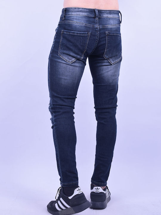 Denim pants with rips and tears Blue