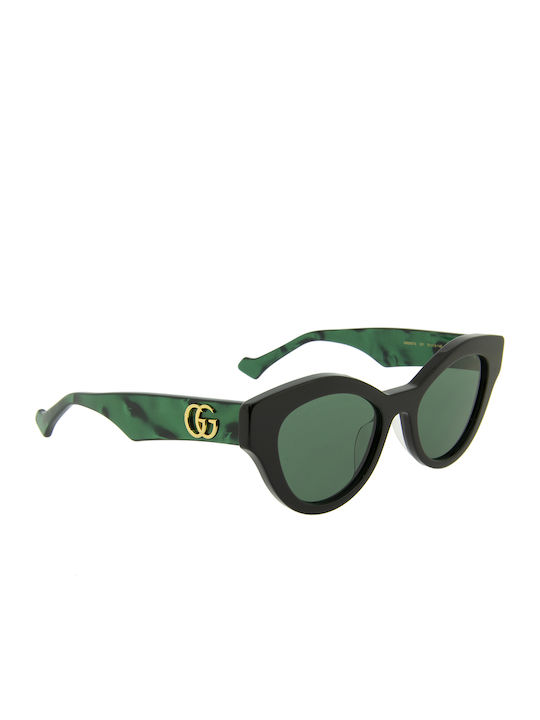 Gucci Woman Sunglasses With Black Horn-Rimmed Frame And Grey Lens GG0957S 001