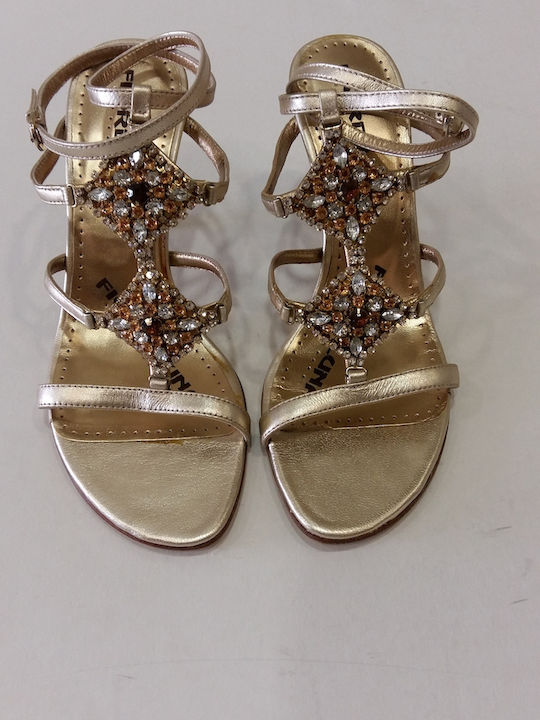 Gold leather sandals with rhinestones that tie at the ankle