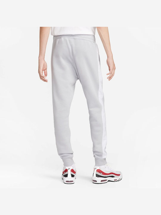 Nike Pantaloni de trening cu elastic Fleece - Polar Gri
