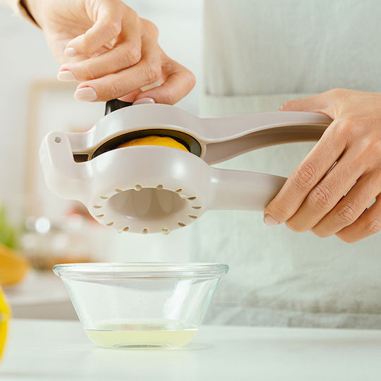 Nava Hand Press Lemon made of Plastic in Yellow Color