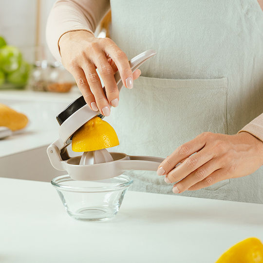 Nava Hand Press Lemon made of Plastic in Yellow Color