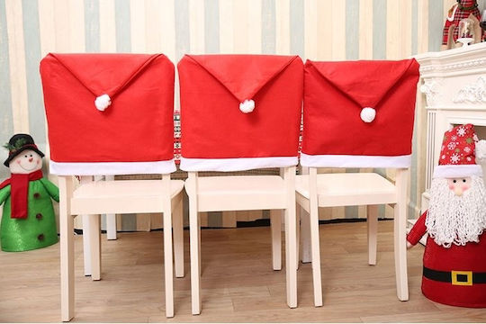 Set de huse pentru spătarul scaunului Zola 6 bucăți model pălărie de Moș Crăciun 65x50 cm
