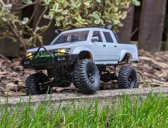 Wpl C64-1 RC Car Toyota Hilux Four-Wheel Drive Lifted 1/14 2.4g 4WD RTR Proportional Control White