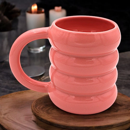 Rosa Tasse mit geprägtem Design 1kzn58