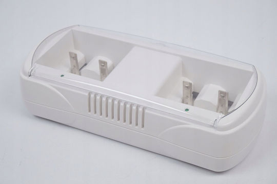 Panasonic BQ-CC15 Battery Charger for 4 Ni-Cd/Ni-MH Batteries with Size AA/AAA/9V/D in White Color