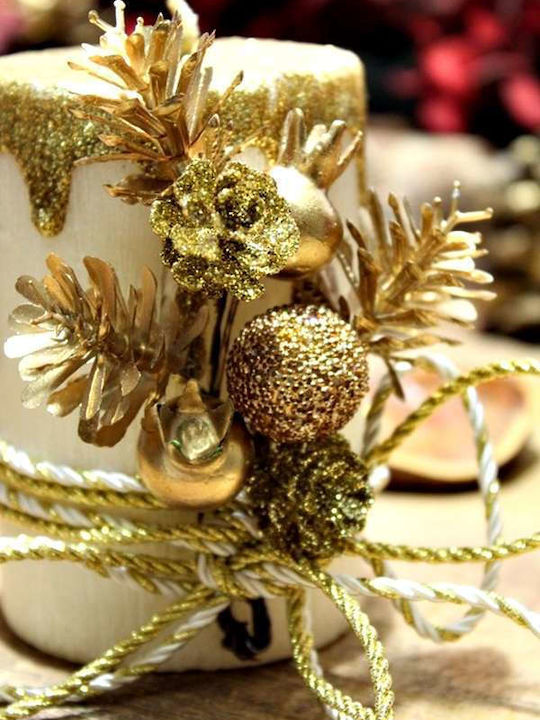 Gerakis The translated Liquid template in German language: Weihnachtskerzen & Kerzenständer Kerze Gold 10x6.5cm.