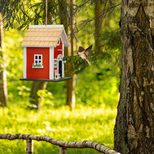 Dekoratives Vogelhaus im rustikalen Stil