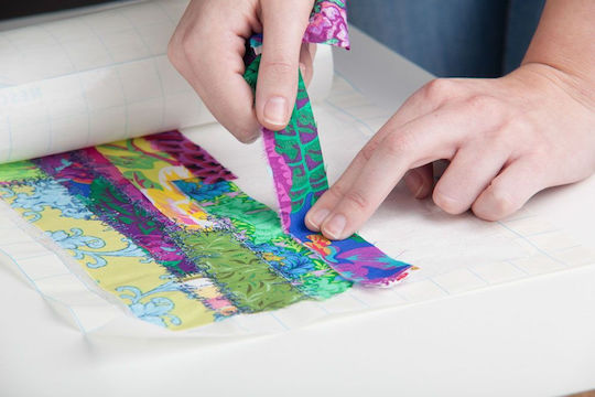 Inserție Autocolantă Pentru Broderie Bucăți Mici Decupate Filmoplast H54 Vlieseline 100 Cm Lungime X 54 Cm Lățime