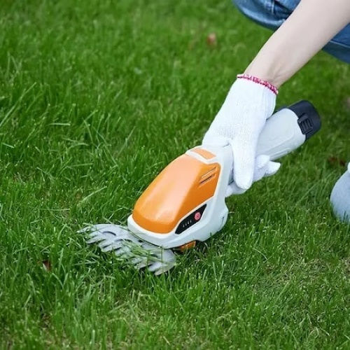 Elektrisches Gartengerät Doppelter Schneidefunktion Rasen und Sträucher Zwei Scheren Inklusive Verstellbarer Höhengriff Grau Orange