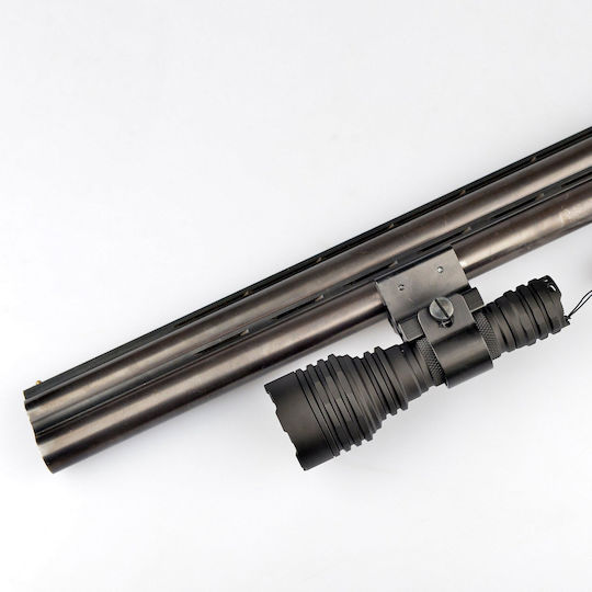 Magnetic Holder Hanging A Flashlight On A Gun Dm2