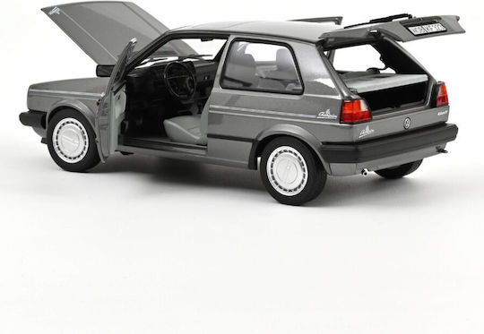 Machete Auto Volkswagen Golf Champion Grey Metallic 1989 1:18 Norev