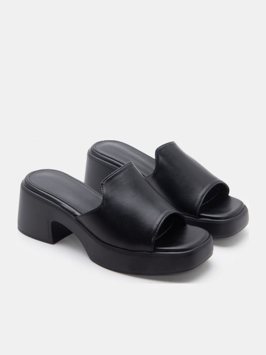 Mules With Low Heel In Black Colour