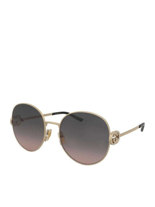 Gucci Women's Sunglasses with Gold Metallic Frame and Gold Lens GG2047S 002