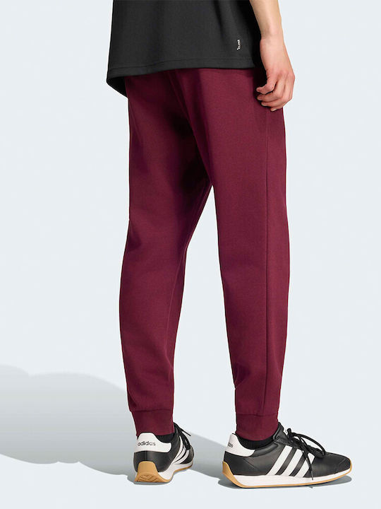 adidas Feelcozy Pantaloni de trening Burgundy