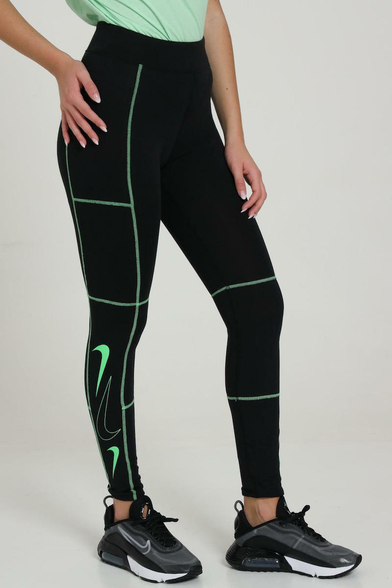 black nikes with green swoosh