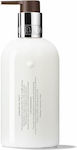 Molton Brown Flora Luminare Feuchtigkeitsspendende Handcreme und Nägel 300ml