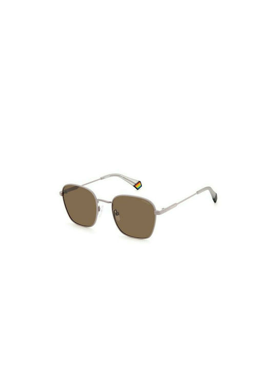 Polaroid Sonnenbrillen mit Beige Rahmen und Bra...