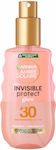 Garnier Ambre Solaire Invisible Protect Glow Transparent Rezistentă la apă Crema protectie solara Loțiune pentru Corp SPF30 în Spray 150ml