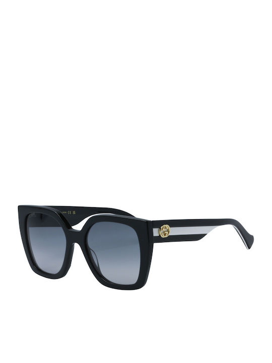Gucci Women's Sunglasses with Black Plastic Fra...