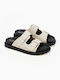 Flatform-Sandalen aus Wildleder in Beige