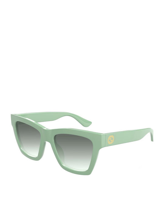 Gucci Women's Sunglasses with Green Plastic Fra...