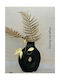 Schwarze Vase für Blumenarrangements