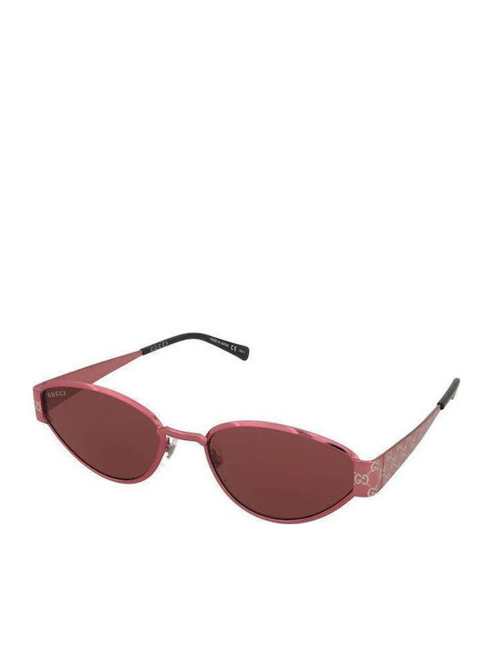 Gucci Women's Sunglasses with Red Metal Frame a...