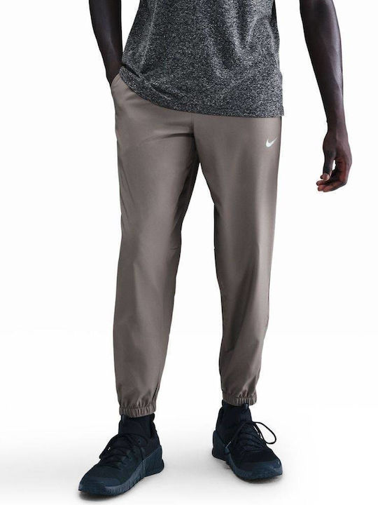 Nike Pantaloni de trening Dri-Fit Lucios Cave S...