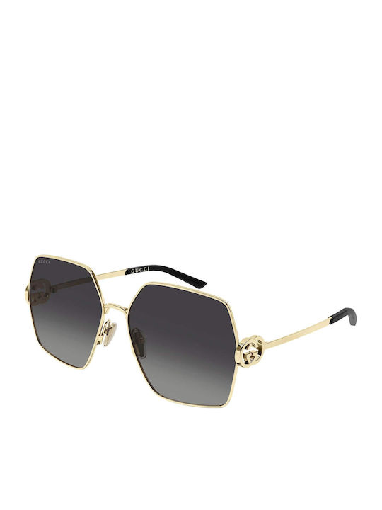 Gucci Woman Sunglasses with Gold Metallic Frame...