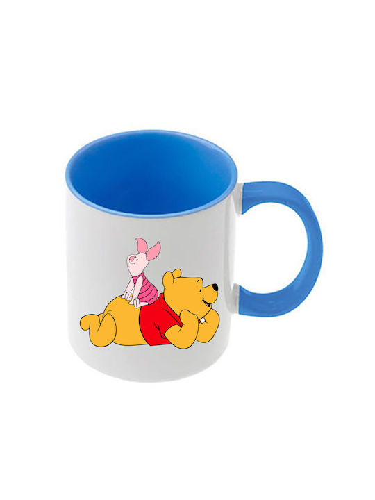 Winnie-Pooh-Tasse mit hellblauem Henkel und hel...