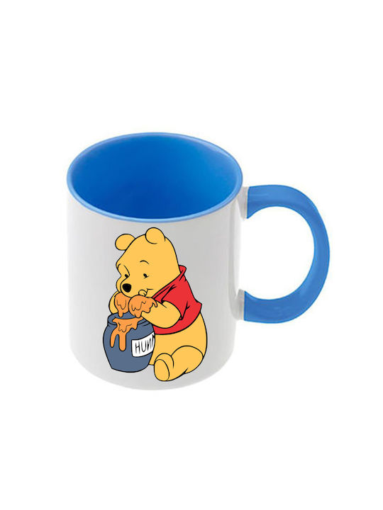 Winnie-Pooh-Tasse mit hellblauem Henkel und hel...